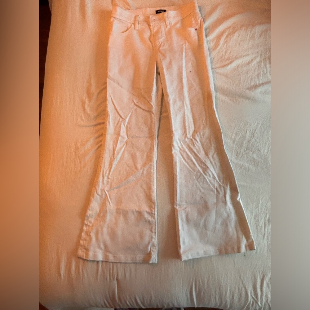 White Express flared denim jeans.